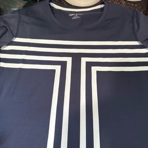 Tory Burch long sleeve workout shirt and matching shorts.